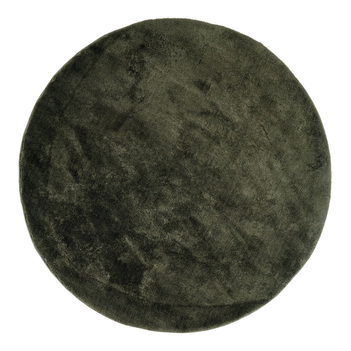 Rond groen vloerkleed van polyester in moderne woonkamer