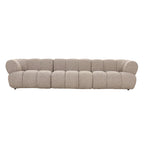 Modulaire 4-zits bank in zandkleurige boucle stof in moderne woonkamer