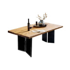 Teakhouten eettafel met metalen poten in industriële stijl