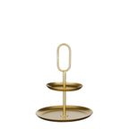 Gouden metalen etagère met twee lagen in moderne woonkamer