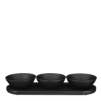 Zwarte mangohouten schaaltjes en dienblad in moderne eetkamer