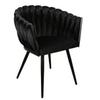 Zwarte Wave stoel met weefpatroon rugleuning in moderne eetkamer